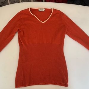 Cute, orange cashmere sweater. Size Medium
